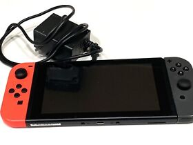 Nintendo Switch Gray Console with Neon Red and Black Joy-Con