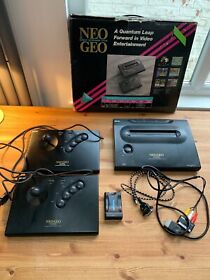 Neo Geo AES Console - MAX 330 with box and two game pads. Good condition.