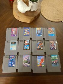 Lote de 12 juegos de Nintendo NES - Mario Bros, Los Simpson, Burgertime, Rad Racer 
