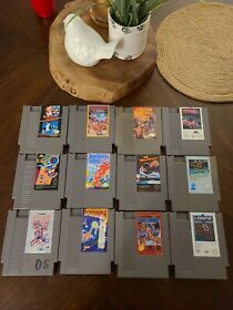 Lote de 12 juegos de Nintendo NES - Mario Bros, Loopz, 3-D Worldrunner, Rad Racer 
