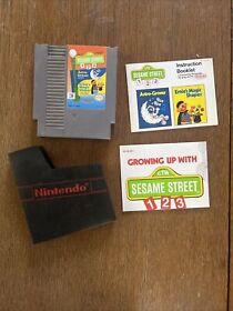 Sesame Street 123 NES cartridge, case, manual, and poster (Nintendo, 1985)