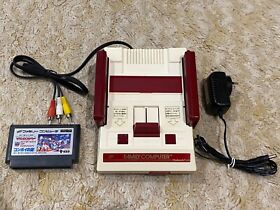 Nintendo Famicom console + Transformers game + composite video output