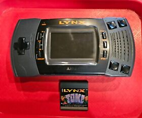 ATARI LYNX CONSOLE & 1992 Game TOKI Both Untested & SOLD AS IS