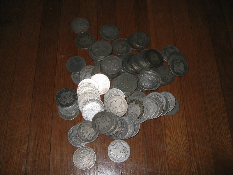 100 PRE 1921 MORGAN SILVER DOLLARS IN AND AROUND G