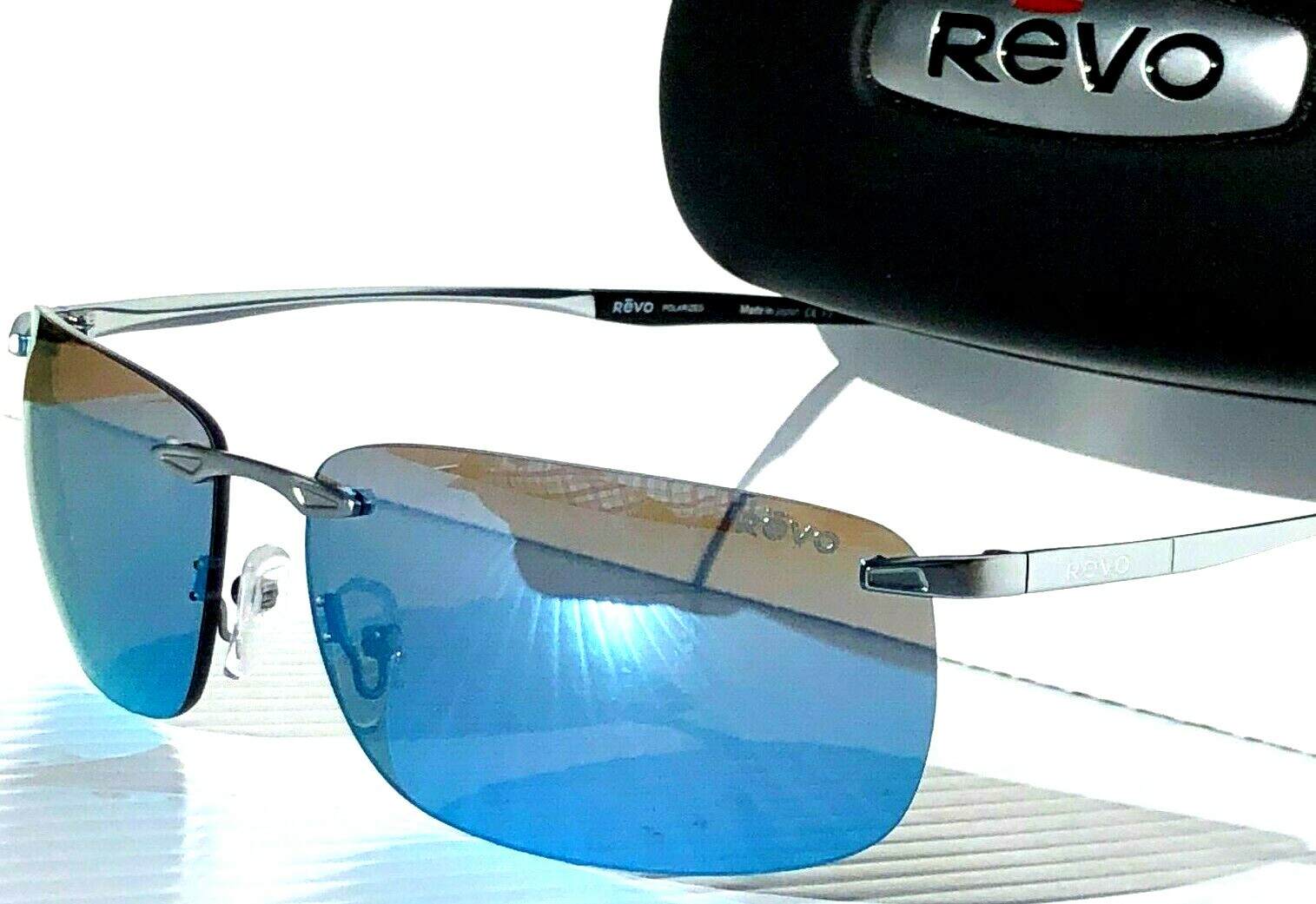 NEW* REVO DESCEND Z Metal Satin Chrome POLARIZED Blue Water NEW* REVO DESCEND Z Metal Satin Chrome POLARIZED Blue Water
