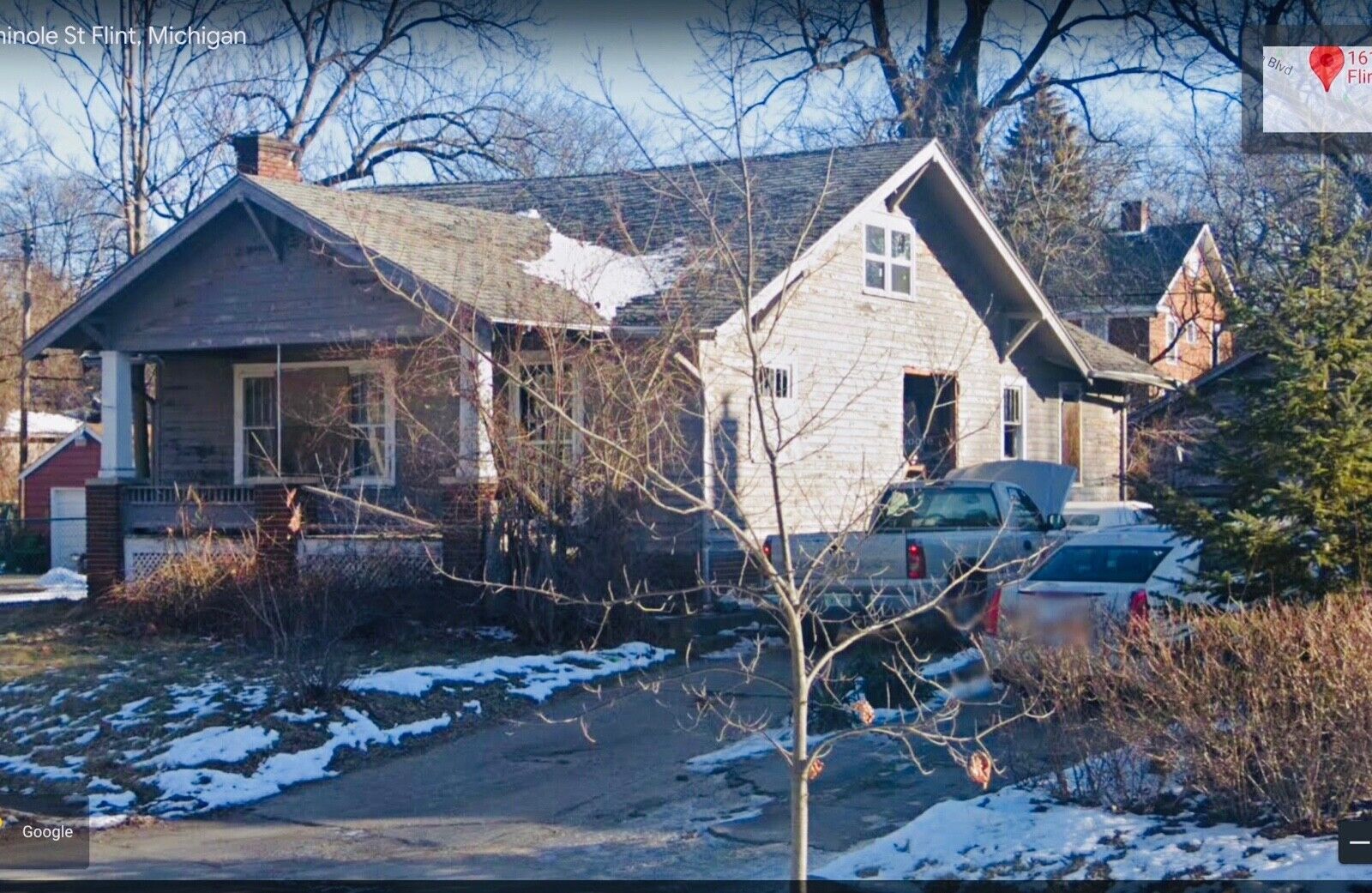 House for sale in Flint  Michigan- needs TLC