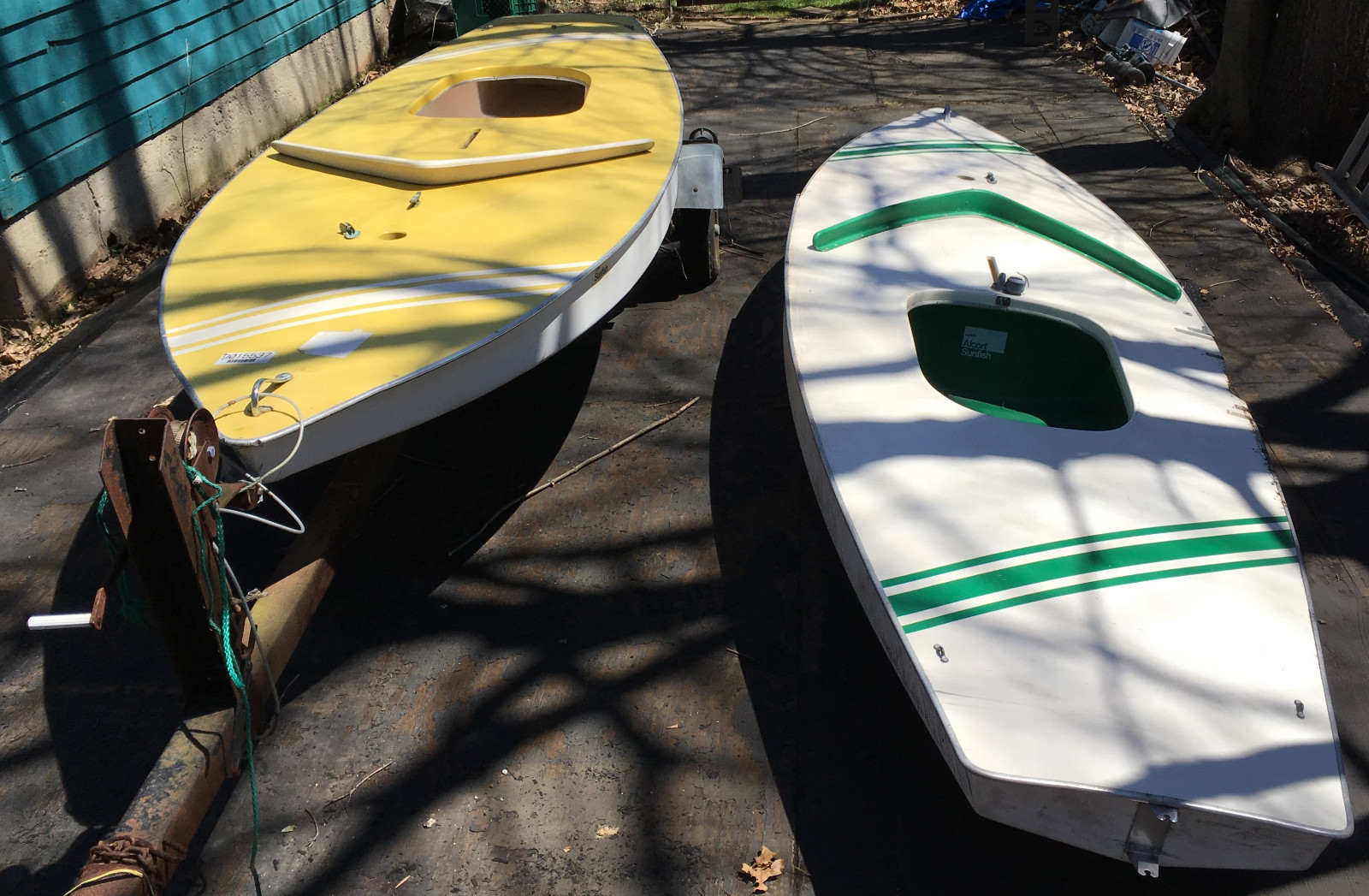 Sunfish Sailboats – 2, Two that need work, and Yard Trailer