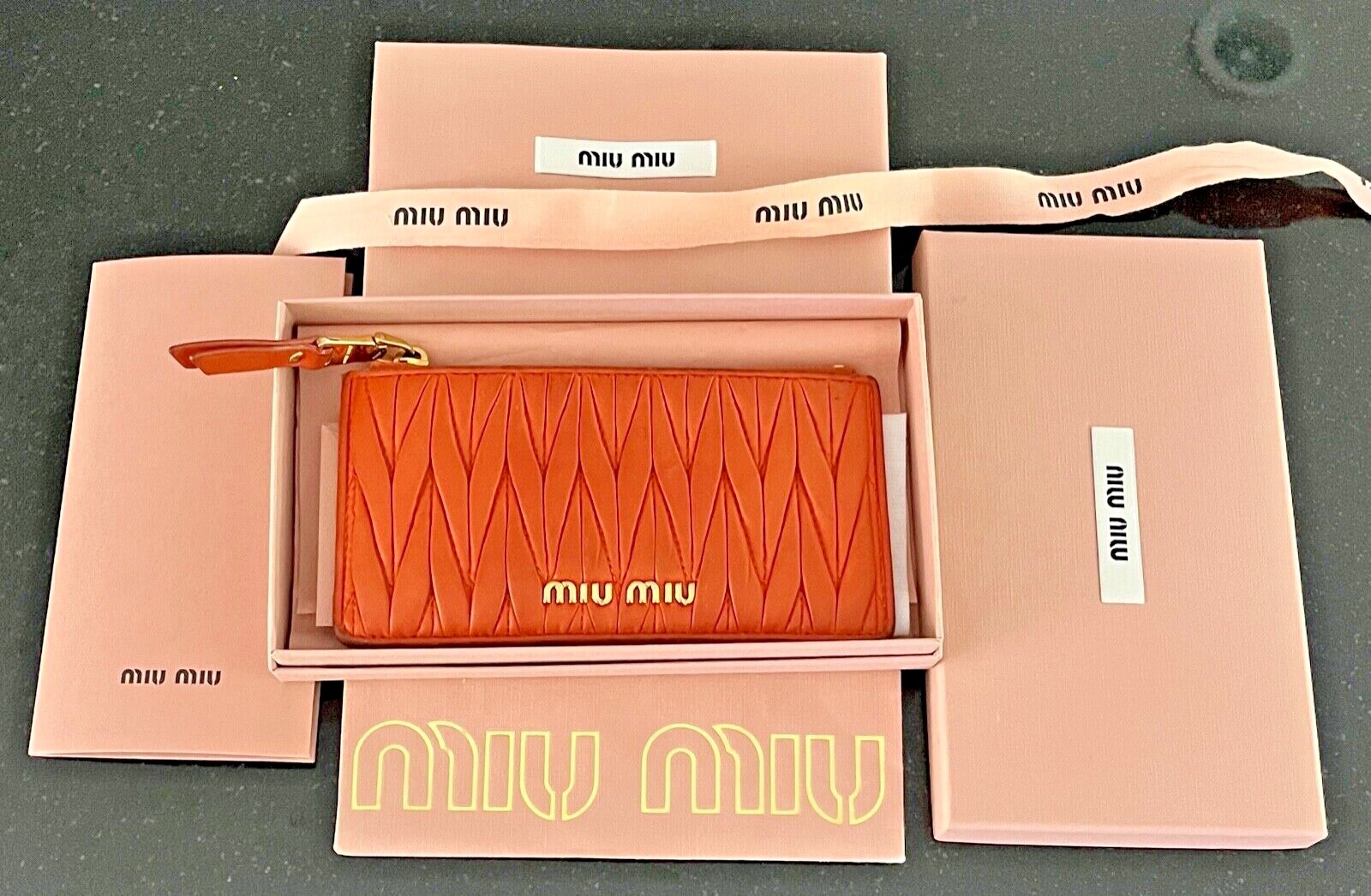 Miu Miu Matelassé Nappa Leather Zipper Wallet in Papaya