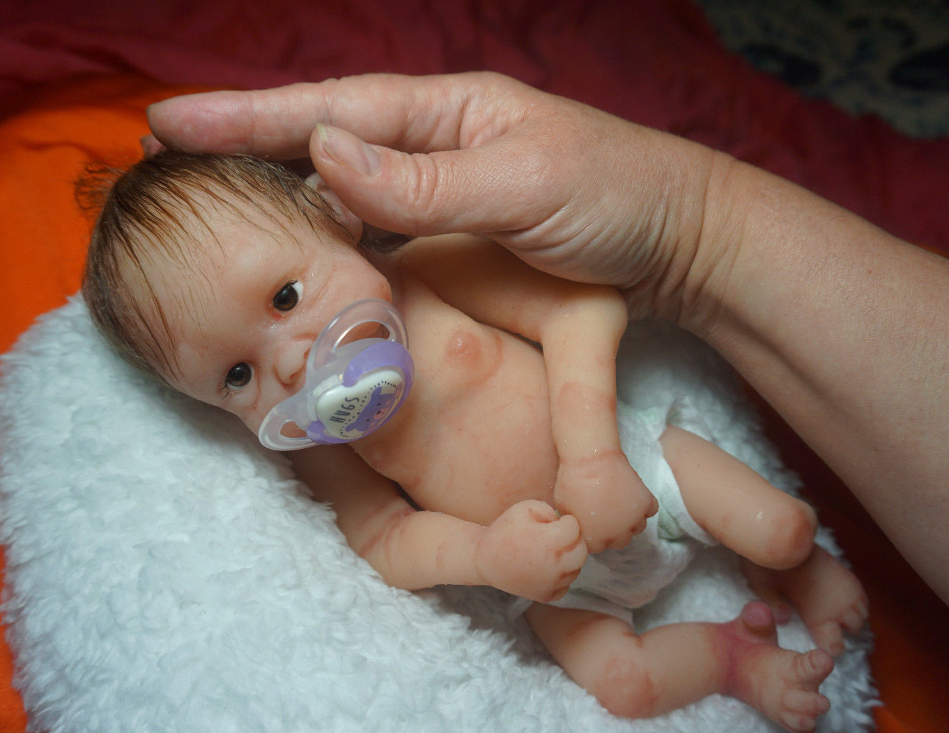 harga miniature silicone baby