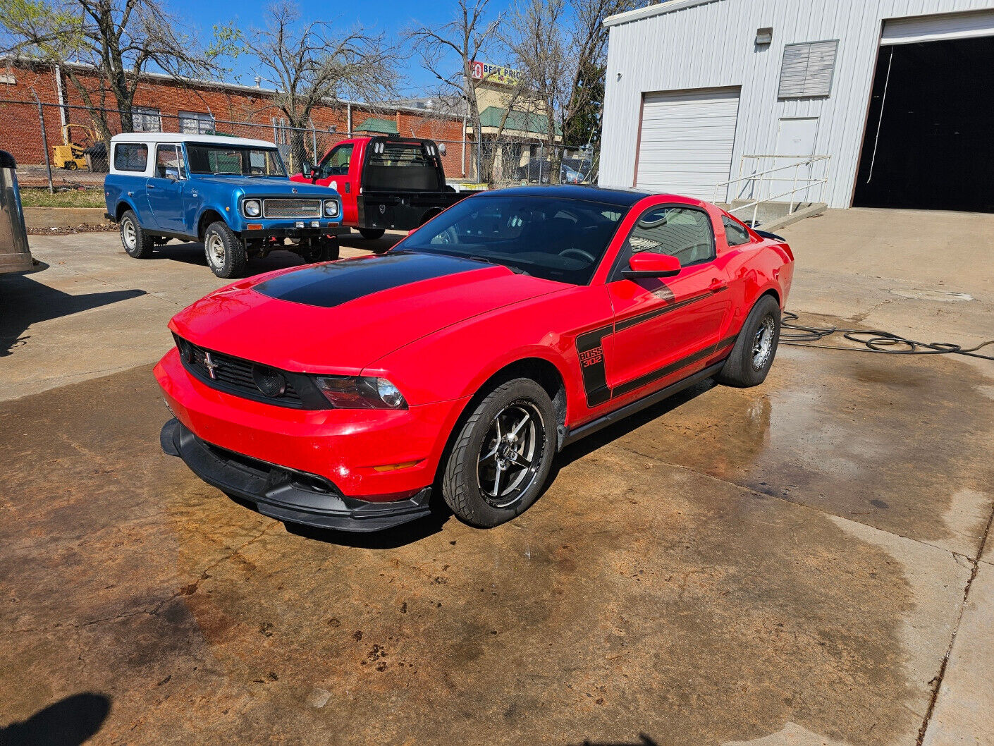 2008 Mustang Boss 302 Coupe Twin Turbo auto runs in the low 10s @ .25 mile.