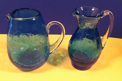 Pair of Small Blue Crackle Glass Pitchers