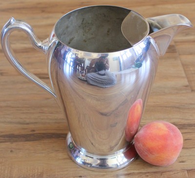 b.rogers silver co water pitcher with ice lid.