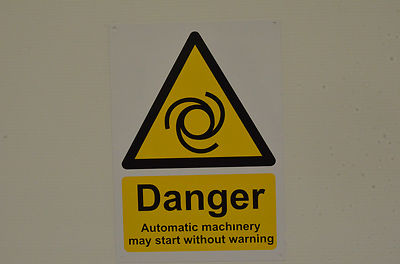 DANGER AUTOMATIC MACHINERY MAY START WITHOUT WARNING A6 sign or sticker hazard