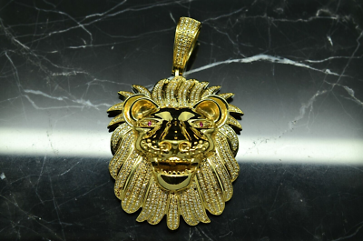 Gold lion pendant 2024 with ruby eyes