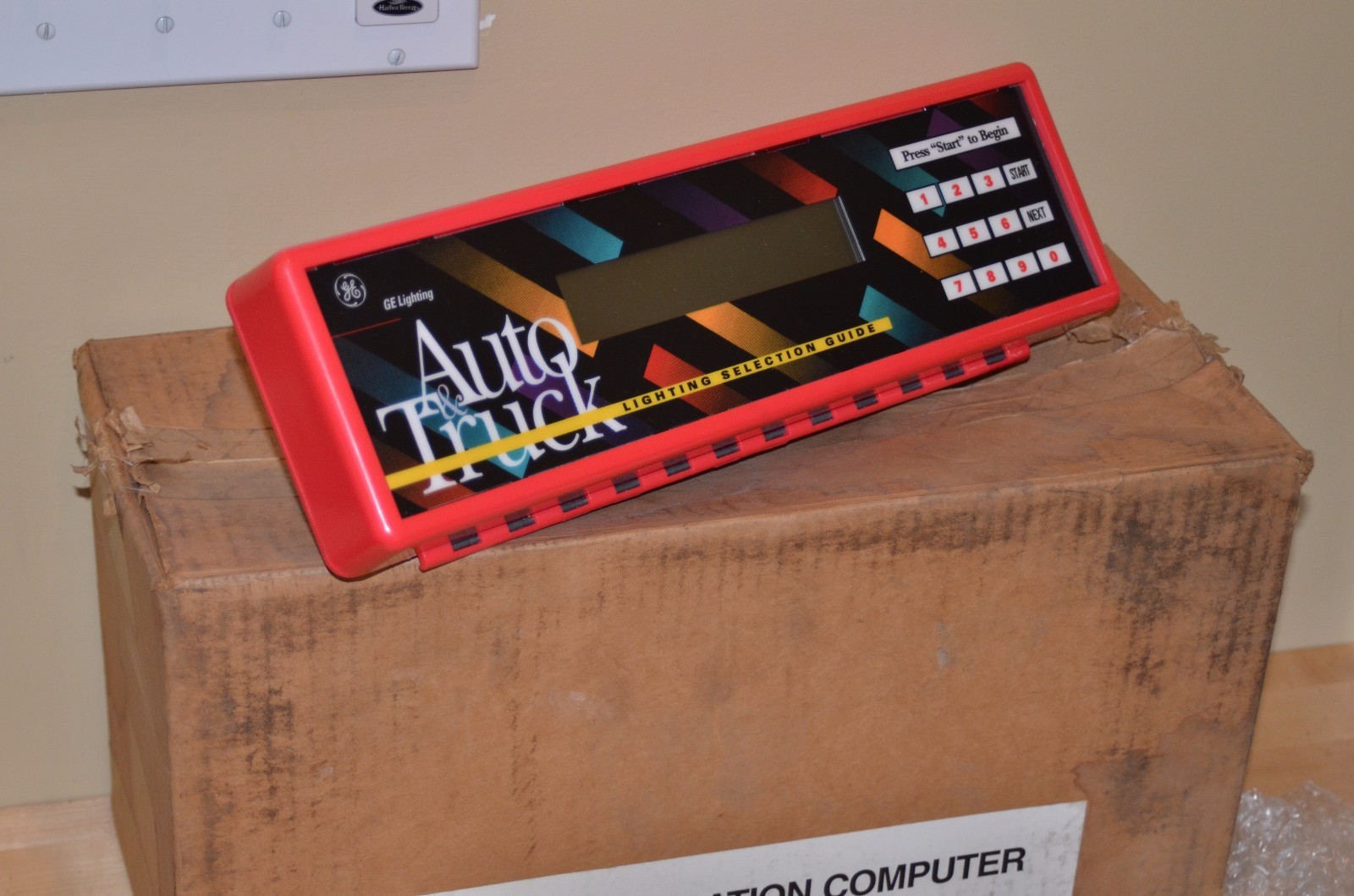 auto truck lighting selection guide store display GE light application computer