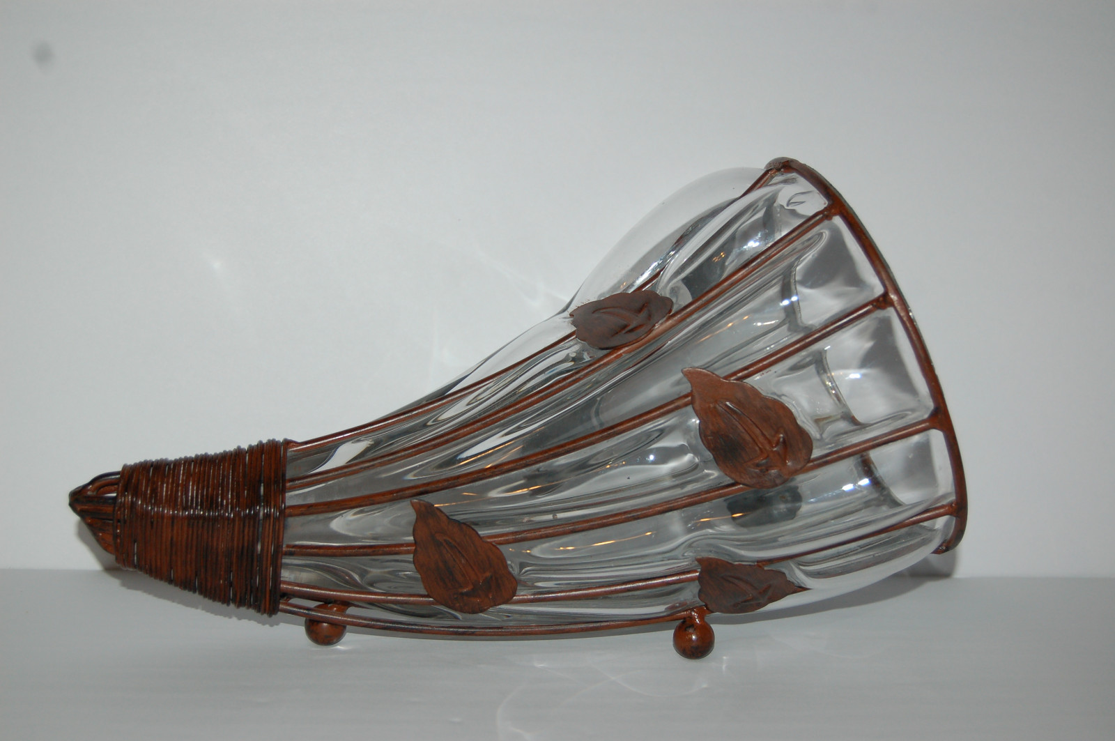 Horn of plenty or conaucopia, Glass with metal frame and leaves, 3 metal feet, c