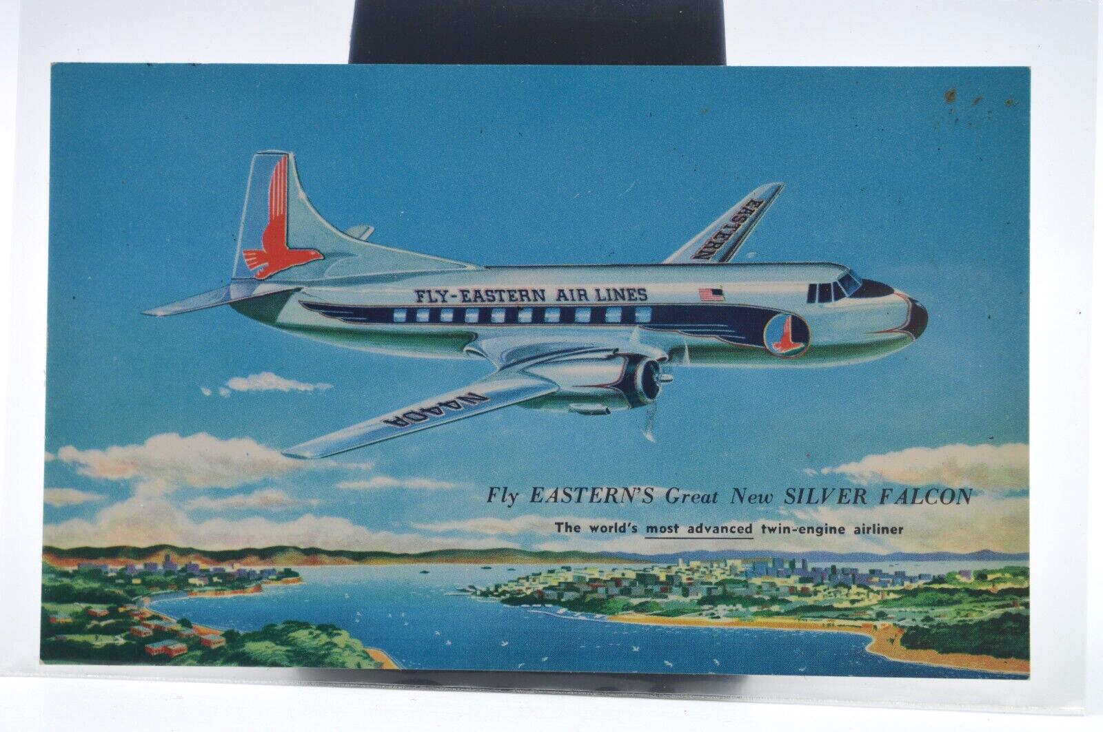 AIRPLANE EASTERN Airlines Silver Falcon Glenn L Martin 1955 Vintage Postcard