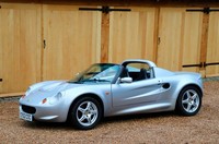Lotus Elise S1, 1998. Silver metallic. Navy Blue leather interior. 46,900 miles.