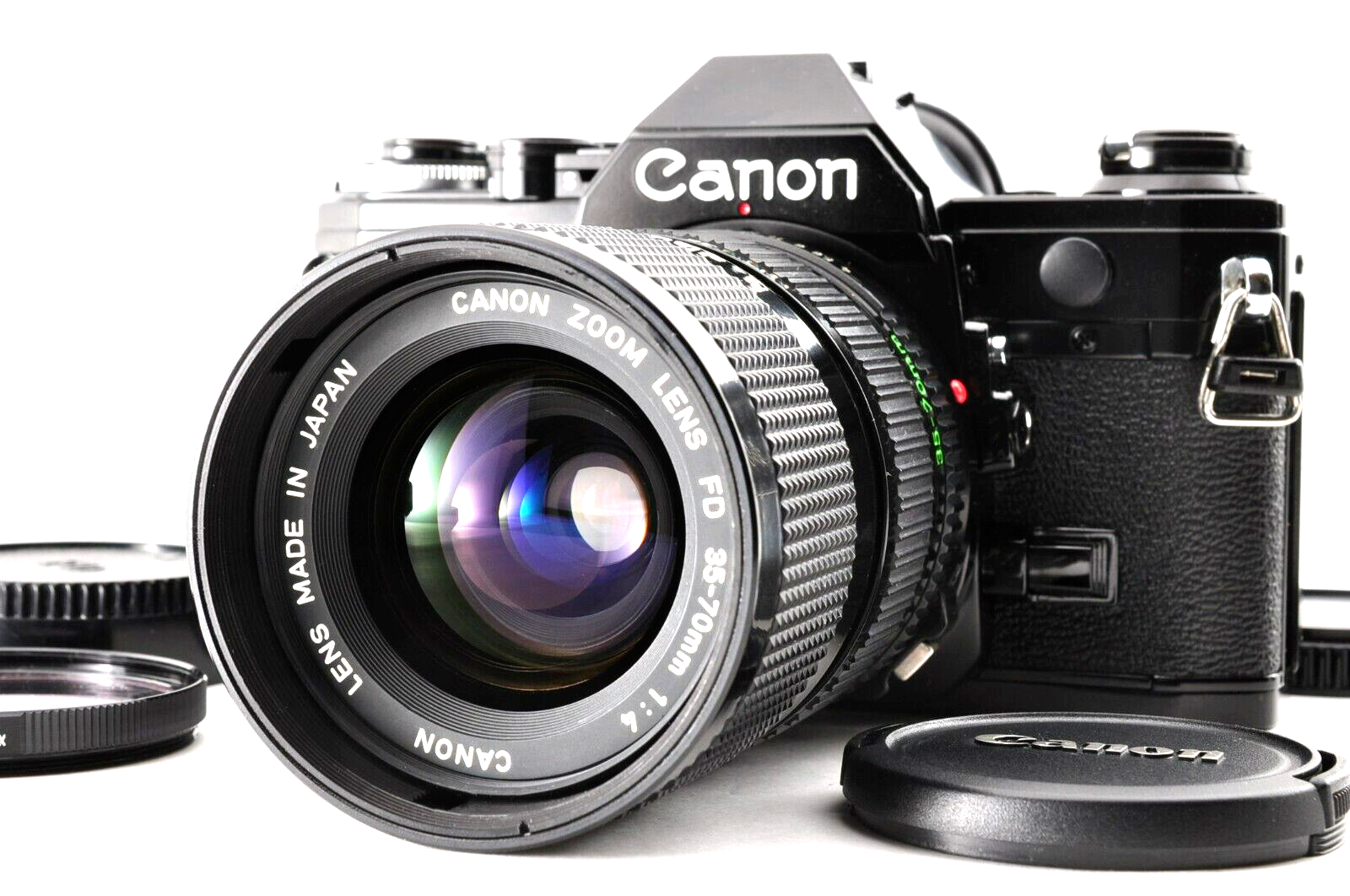 フィルムカメラ Canon AE-1 Black New FD 35-70mm f/4 Lens Canon AE-1 Black SLR Film Camera NEW FD 35-70mm f/4 Zoom
