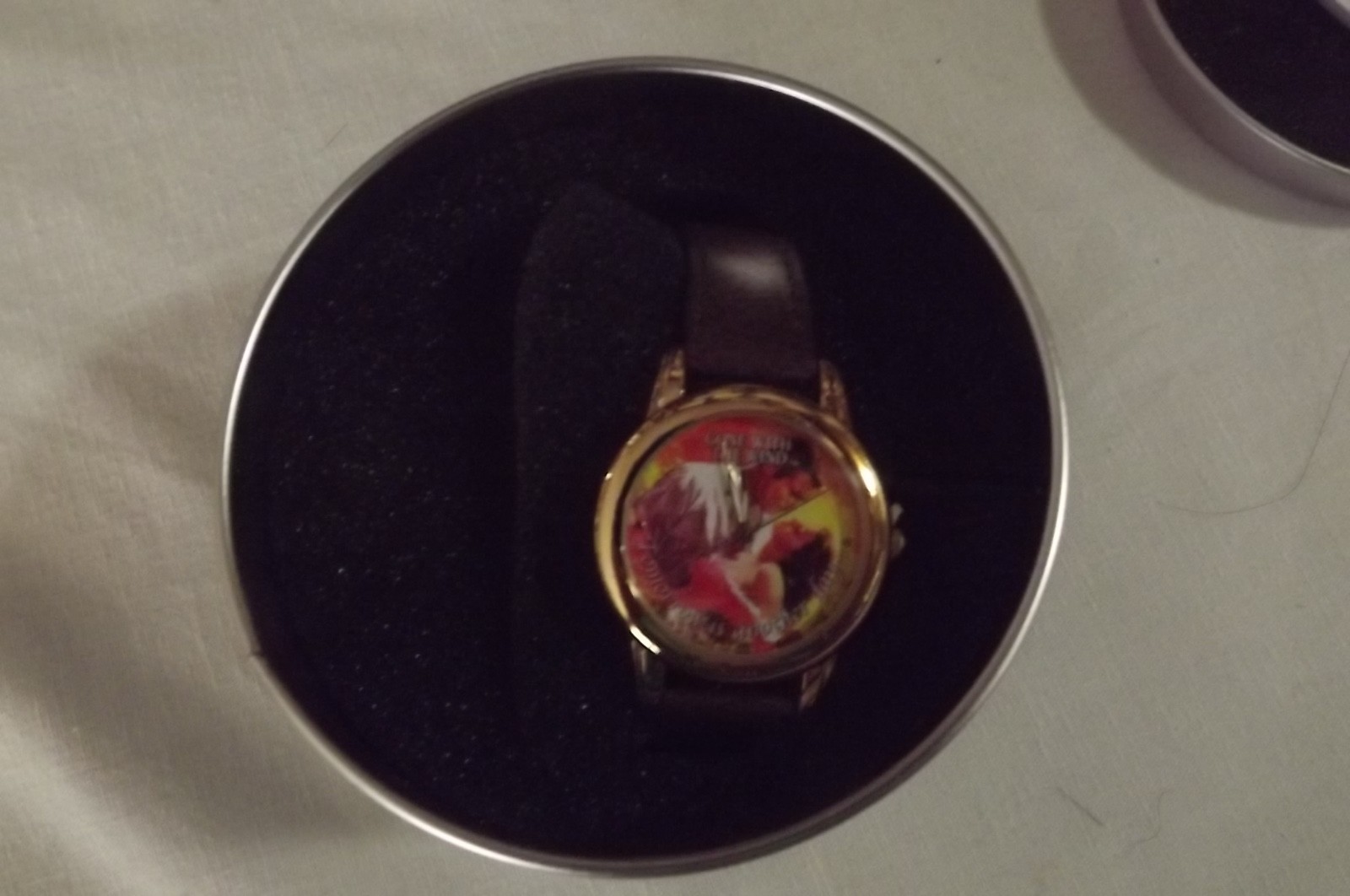 GONE WITH TH WIND COLLECTIBLE WATCH SOLD BY AVON COLLECTIBLE TIN WITH THE WATC