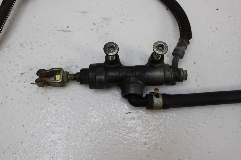 1987 KAWASAKI NINJA ZX750 (#299) REAR BRAKE MASTER CYLINDER W