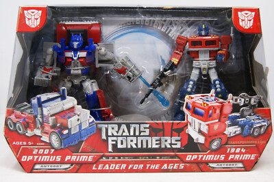 Transformers - Leader for the Ages - 1984 Optimus Prime & 2007 Optimus Prime