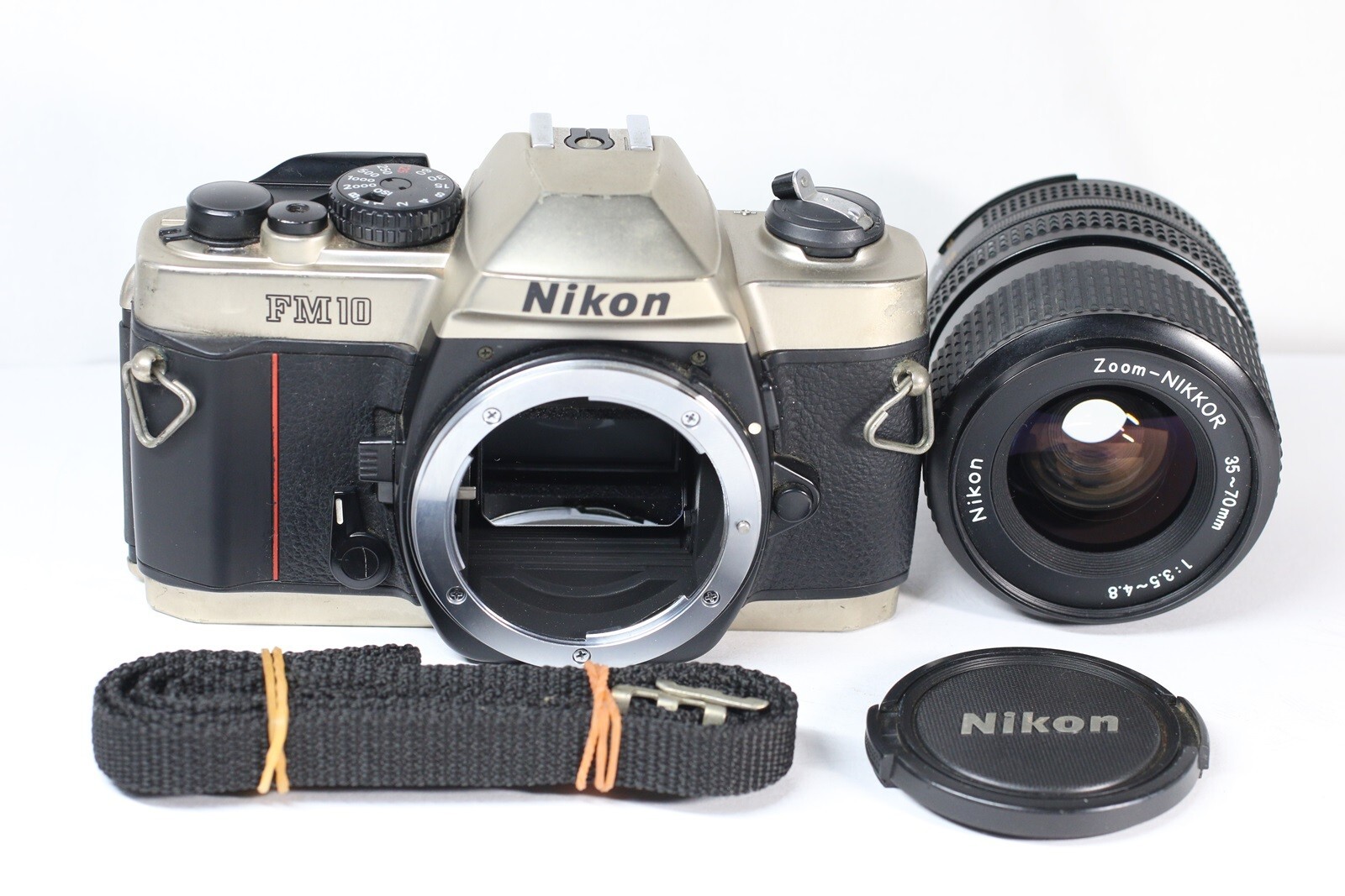 Nikon FM10 SLR 35mm Film Camera + Ai-S Zoom Nikkor 35-70mm F