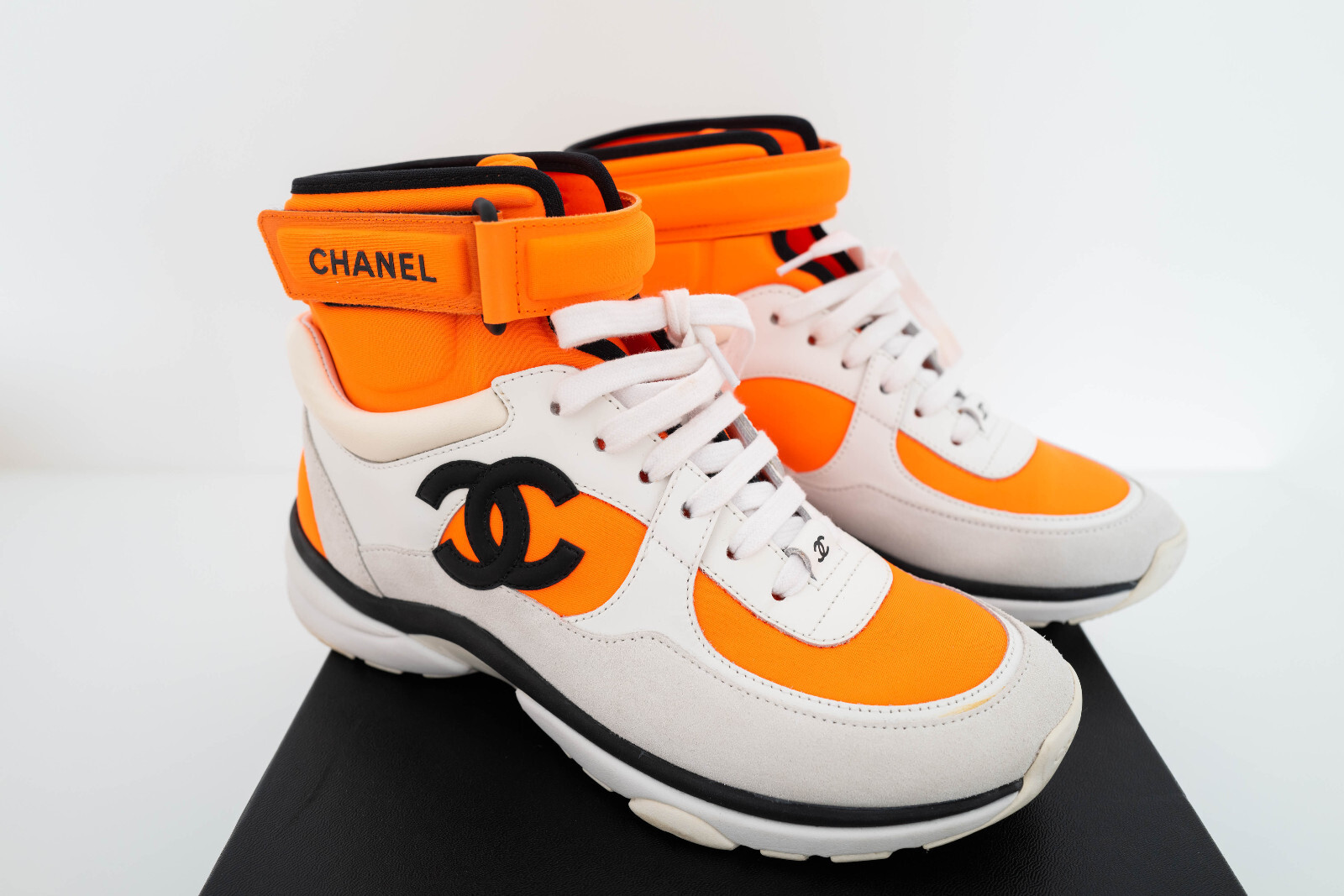 Chanel Women Interlocking CC Orange White High Top Sneakers Chanel Women Interlocking CC Orange White High Top Sneakers