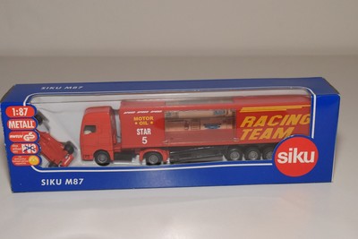 V 1:87 SIKU 1831 MAN TRUCK TRAILER FERRARI RENN TRANSPORTER RACE CAR MINT BOXED