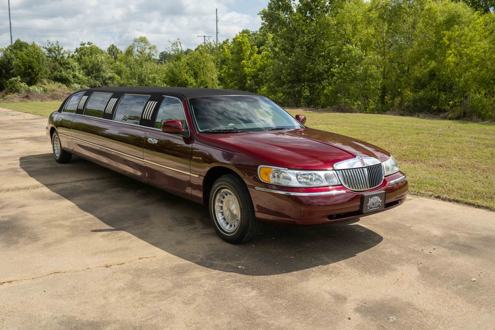 Maroon Lincoln Town Car with 71308 Miles available now!