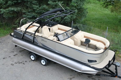 New-2485 LTZ with 200 Hp and trailer