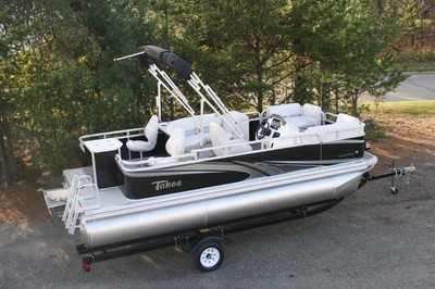 1875 Sport Rear Fish with 25 hp and single bunk trailer.
