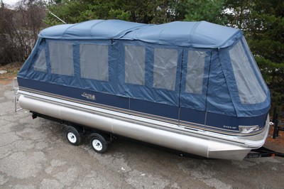 New 24 fish and fun Grand Island pontoon boat with full camper enclosure