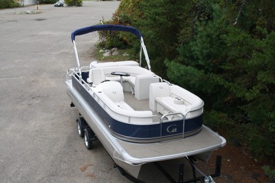 23 GT Cruise pontoon boat with 75 four stroke - dual bunk trailer