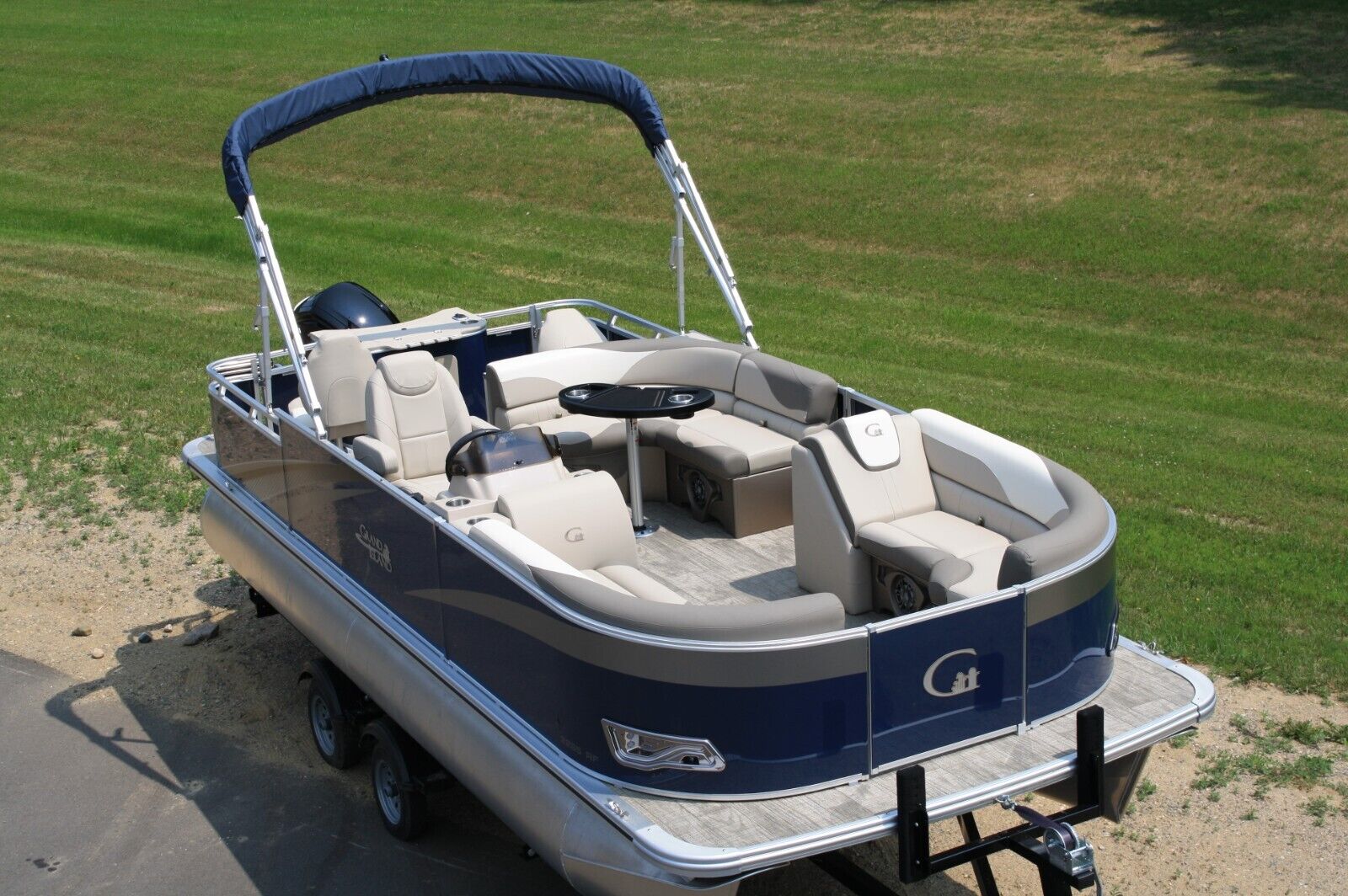 Owner Two tube-New 21 ft pontoon boat with 115 hp and trailer