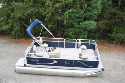 New 16 Ft pontoon boat with 25 hp and trailer