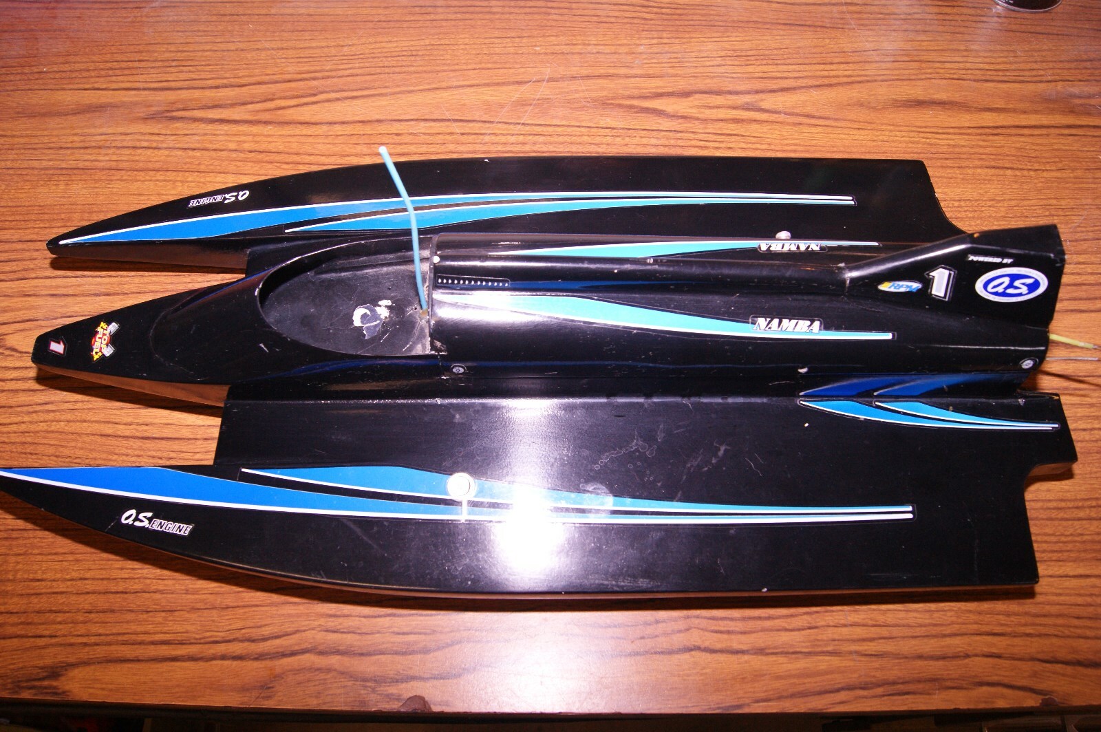 Prather? Dumas?  Mystery brand .21  3.5CC RC Wood Outboard boat hull