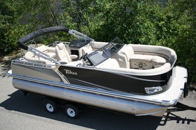 New 2285 LTZ Cruise Tritube, 150 hp. Mercury and bunk trailer