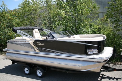 New 22 Tritoon with 175 new four stroke and trailer