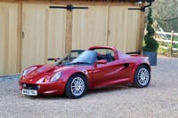 Lotus Elise S1, 2000.   Ruby red metallic with black leather and Alcantara seats