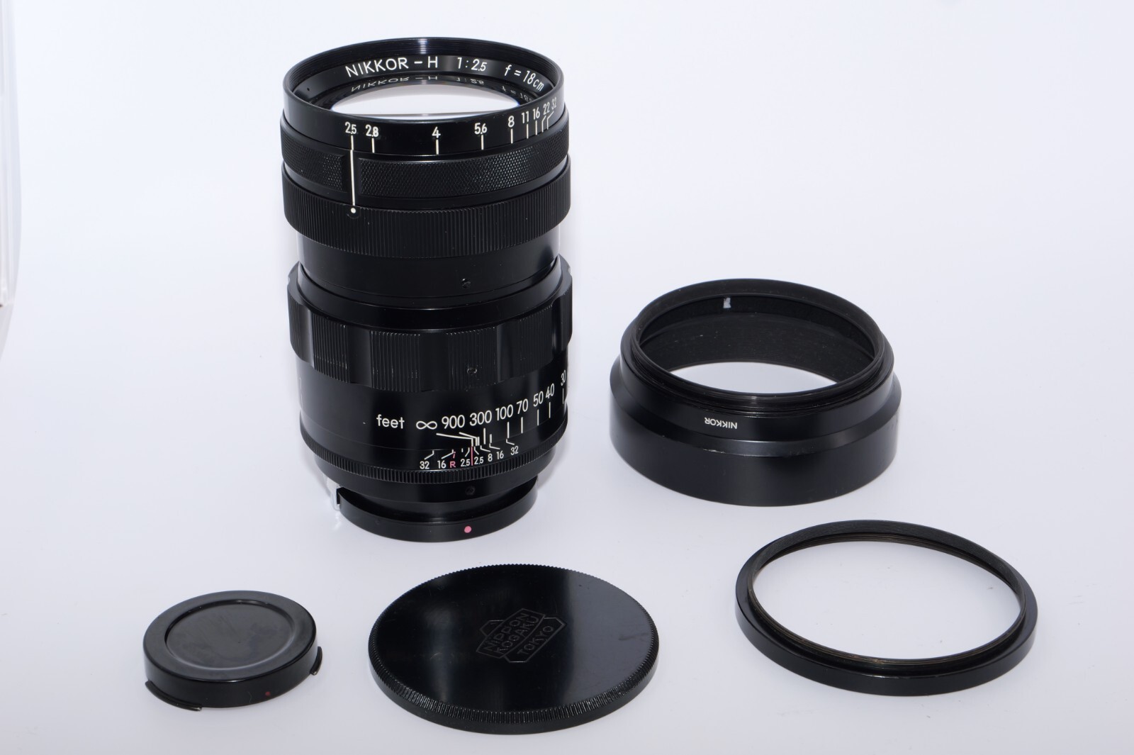 Nikon Rangefinder NIKKOR-H 18cm f2.5 tele lens. Hood. Nikon