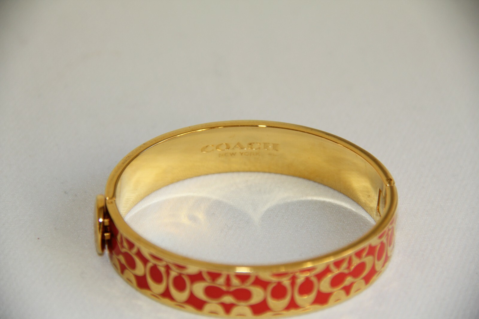 coach orange bracelet