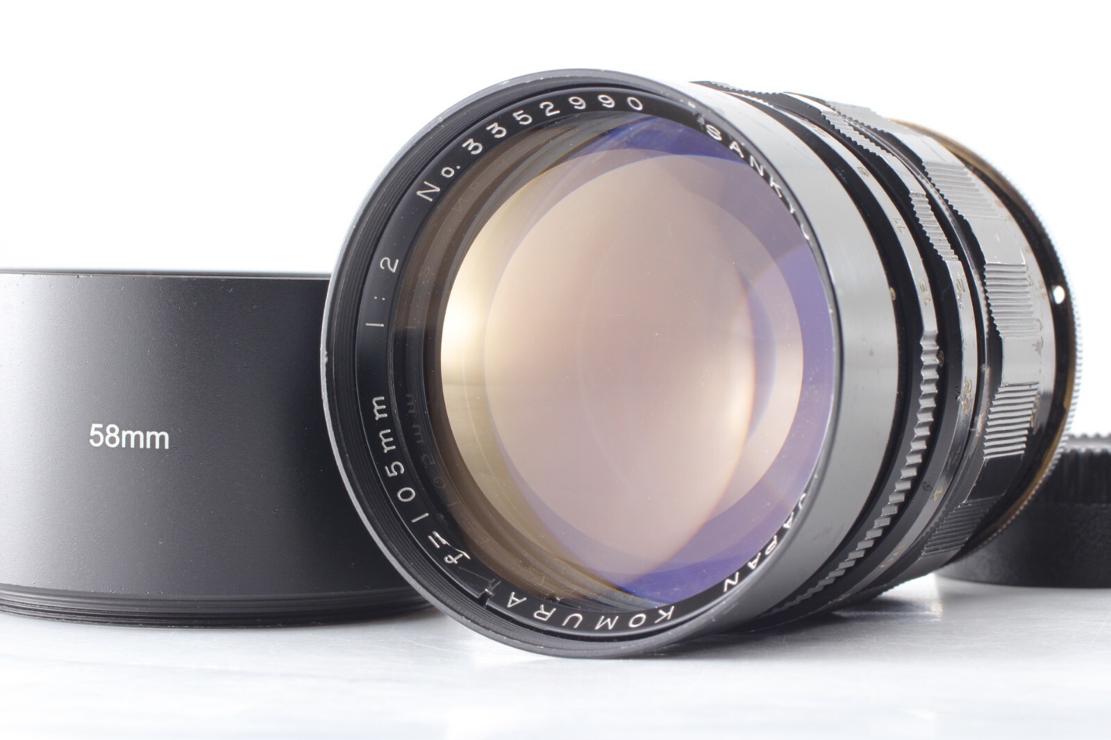 Sankyo Kohki Komura コムラ 105mm F2.5 Sankyo Kohki Komura 105mm F/2.5 | LENS-DB.COM