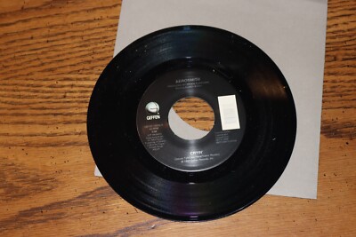 VINYL 45 RECORD AEROSMITH CRYIN B/W WALK ON DOWN UNPLAYED