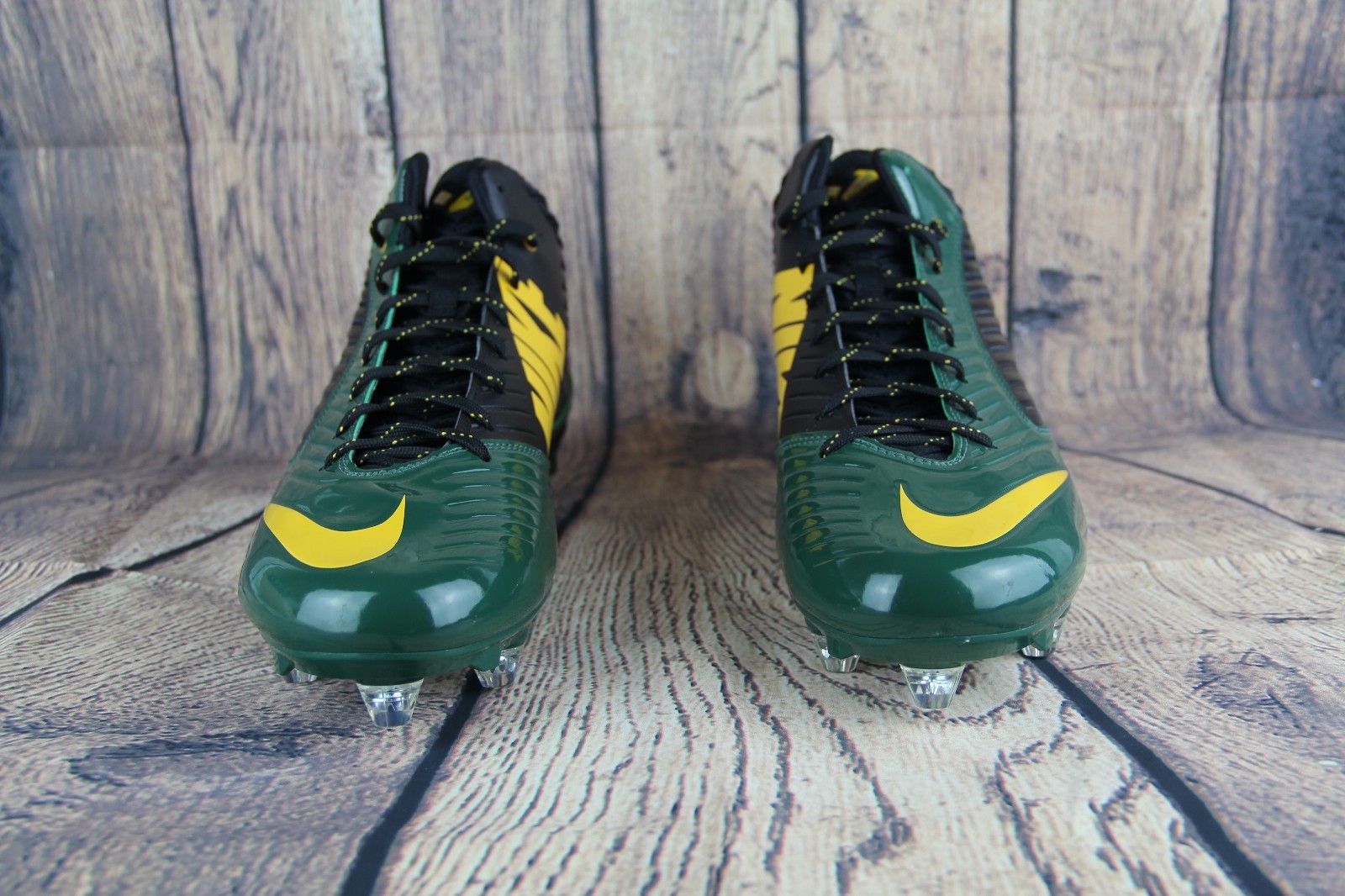 green and yellow football cleats