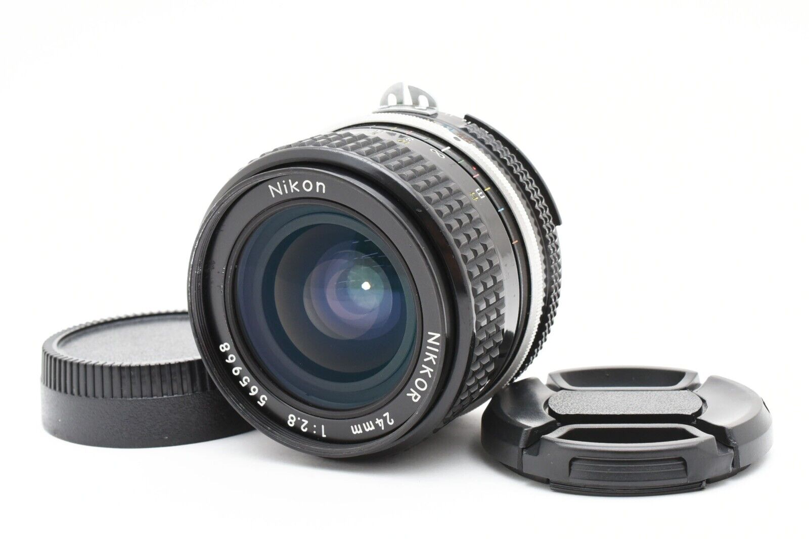 Nikon Ai Nikkor 24mm f/2.8 Wide Angle MF Lens w/Caps [Very Nikon Ai Nikkor 24mm f/2.8 Wide Angle MF Lens w/Caps [Very