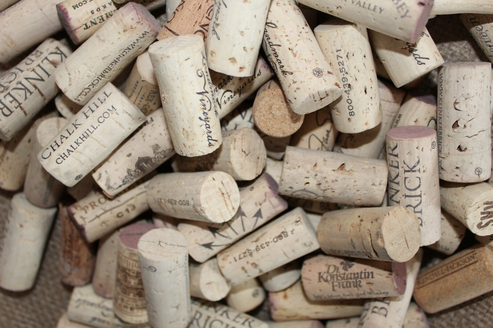 100 used wine corks for crafting or wine making, all natural, no synthetic.