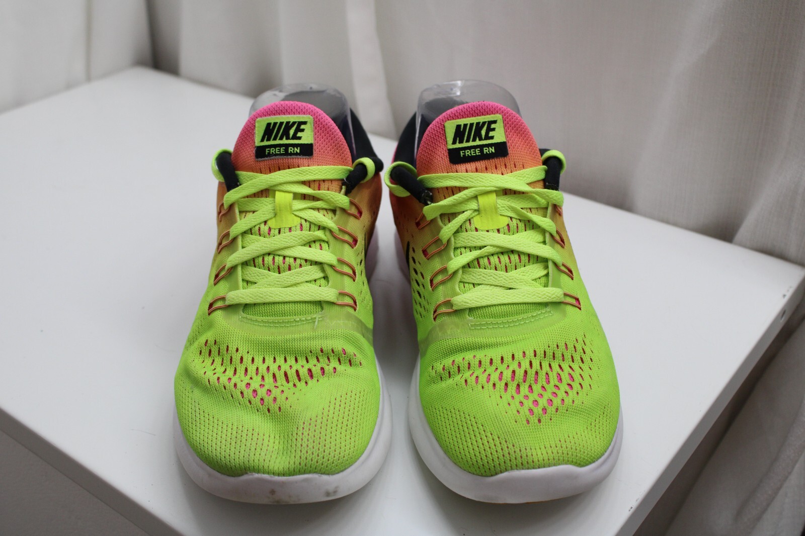 green pink and yellow nikes