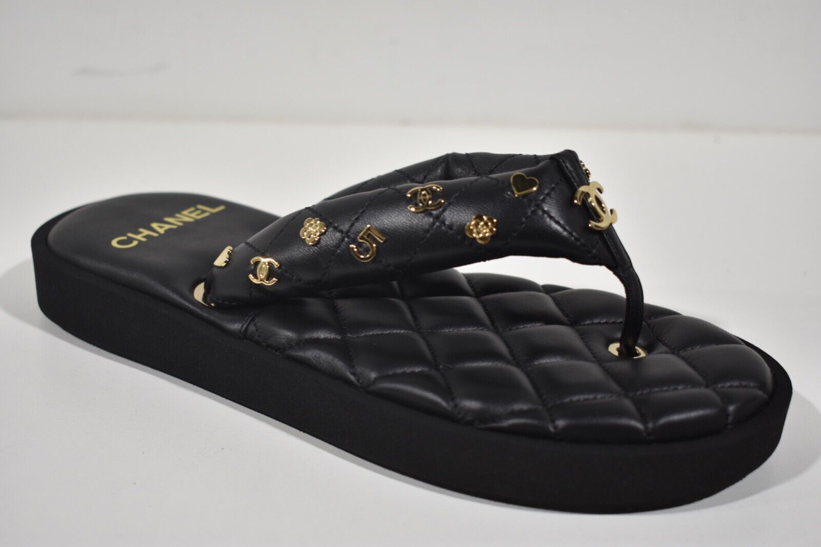 Chanel 23P Black Quilted Charms Padded Pool Thong Logo Slide Chanel 23P Black Quilted Charms Padded Pool Thong Logo Slide