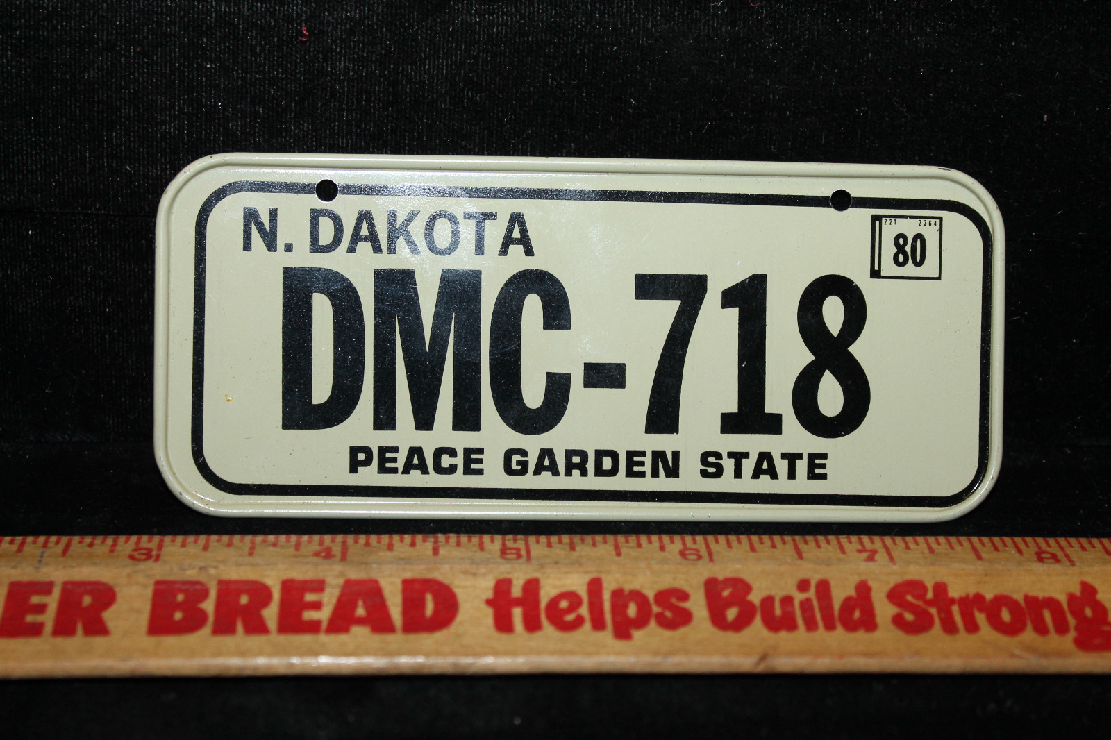 Vintage 1980 N. North Dakota Cereal Mini Bike License Plate #DMC-718 Peace